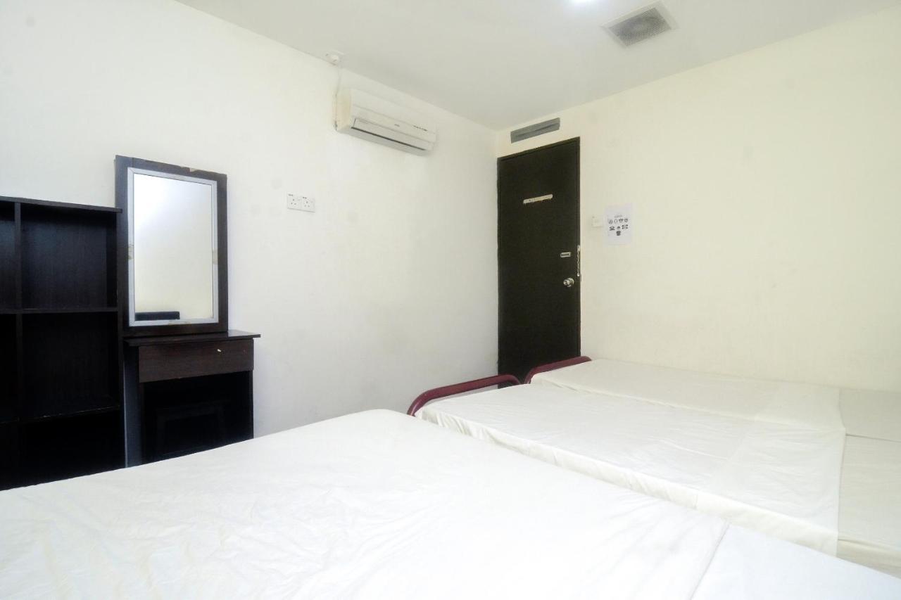 Spot On 89886 Backpacker'S Stay Services Kuching Buitenkant foto