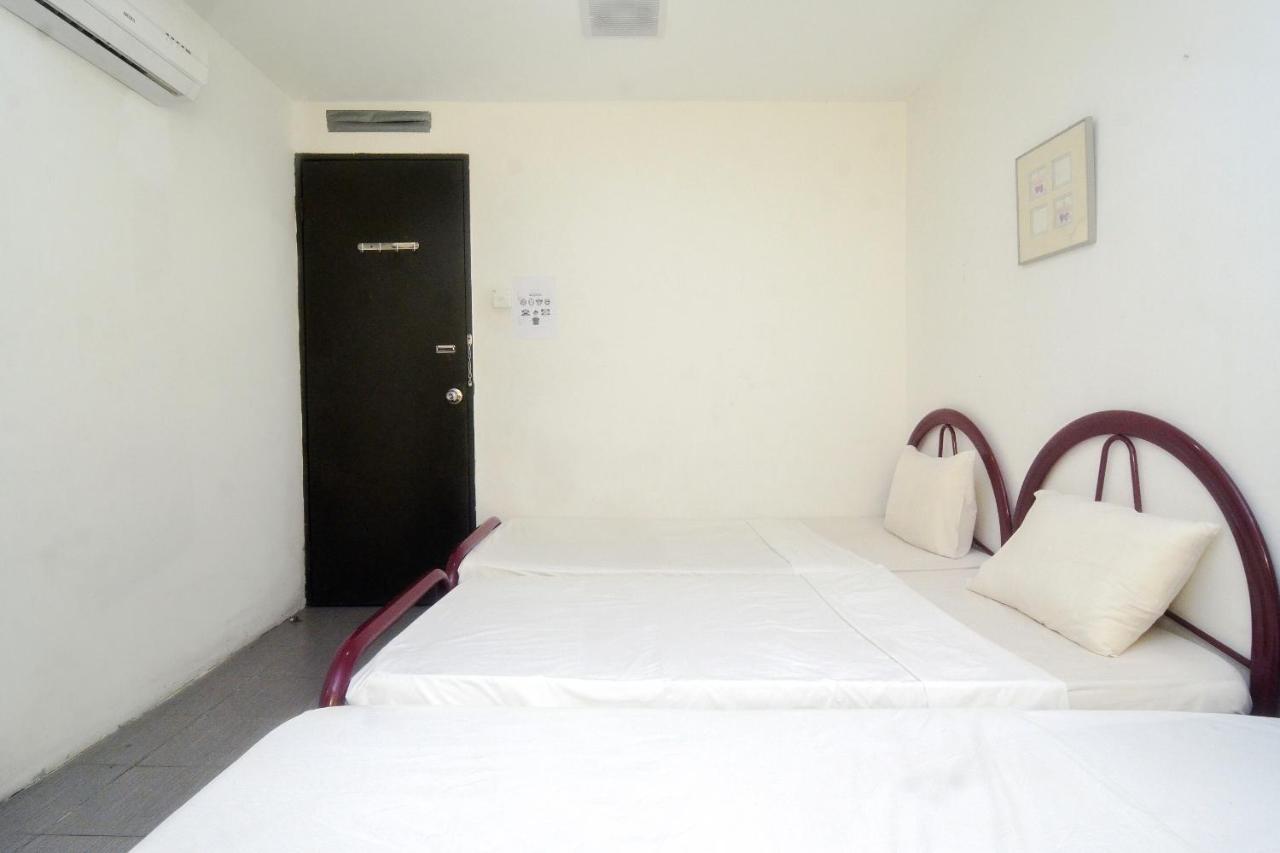 Spot On 89886 Backpacker'S Stay Services Kuching Buitenkant foto